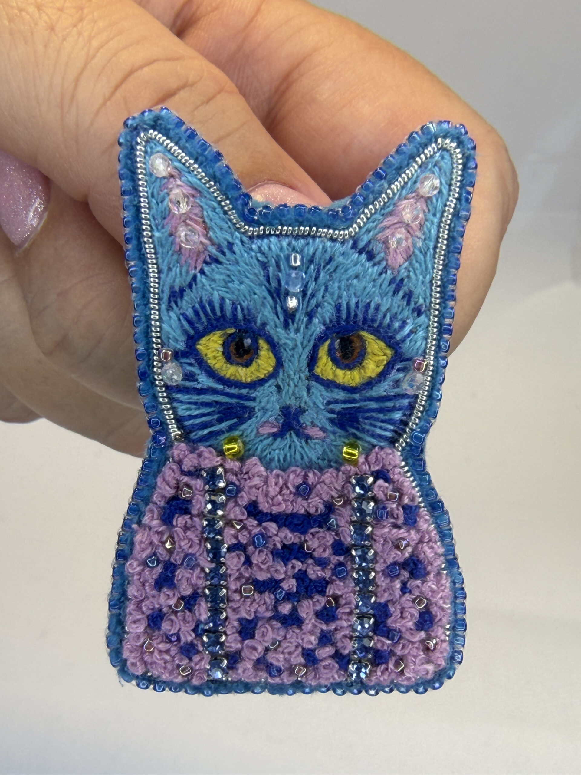 Blue Cat Brooch – Hand Embroidered Satin Stitch Face, Pink Knotted Body Pin — view 2