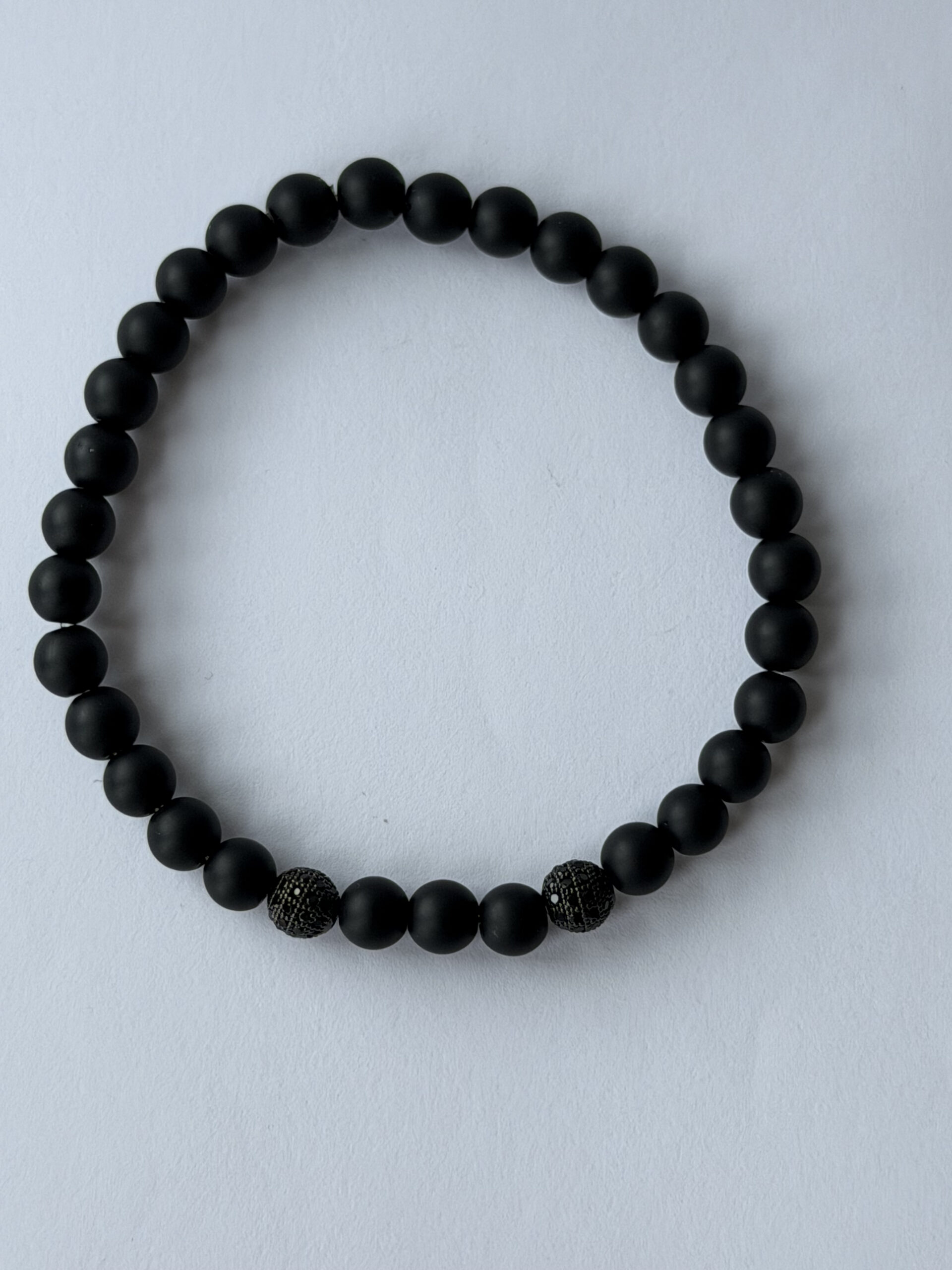 Matte Black Stretch Bracelet for Men, 6 mm Beads, Two Black Pavé Accents — view 2