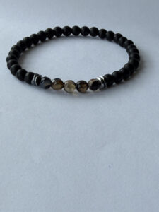 Matte Black and Brown-Striped Beaded Stretch Bracelet for Men, 6 mm — lifestyle photo