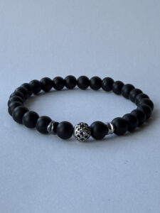 Matte Black Beaded Bracelet for Men, Silver-Color Filigree Accent, 8 mm Stretch — lifestyle photo