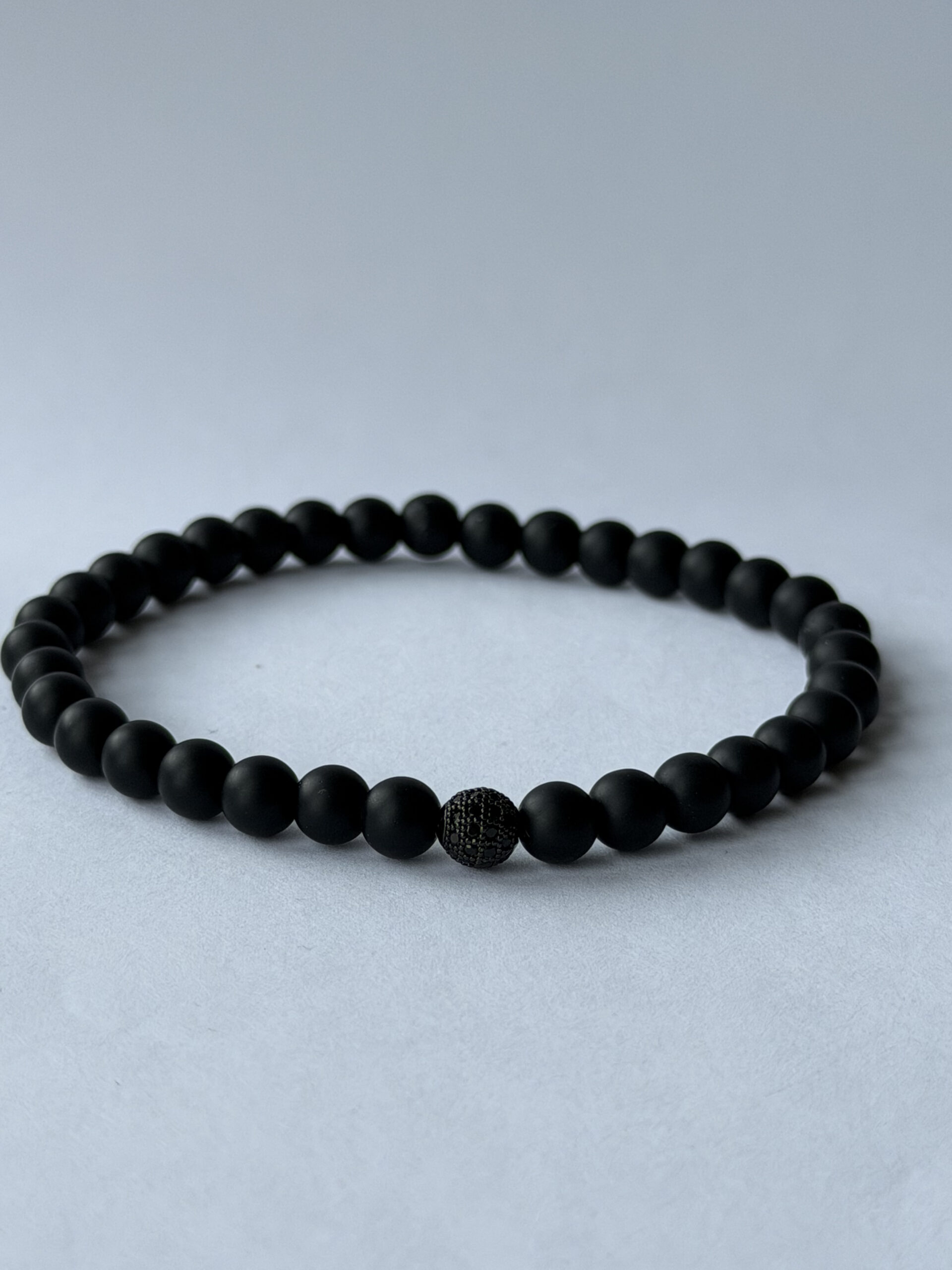 Matte Black Stretch Bracelet for Men, 6 mm Beads, Single Black Pavé Accent — featured image