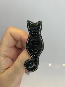 Black Cat Silhouette Brooch – Hand Embroidered Bugle Bead and Rhinestone Pin — lifestyle photo