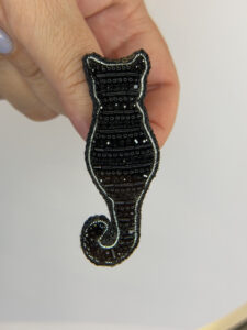 Striped Black Cat Brooch – Hand Embroidered Sitting Silhouette Rhinestone Pin — lifestyle photo