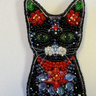 Black Cat Brooch with Red Crystal Flowers – Hand Embroidered Green Eyed Pin — featured image