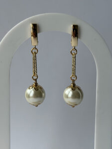 Large Ivory Bead Drop Earrings – Gold-Tone Twisted Bar and Petal Cap Dangles — lifestyle photo