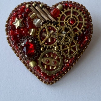 Red Steampunk Heart Brooch with Watch Movement Gears – Hand Embroidered Crystal Pin — featured image