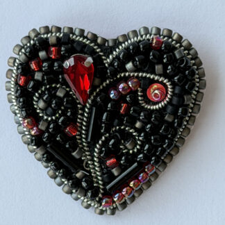 Black Heart Brooch with Red Crystal Teardrop – Hand Embroidered Gothic Pin — featured image